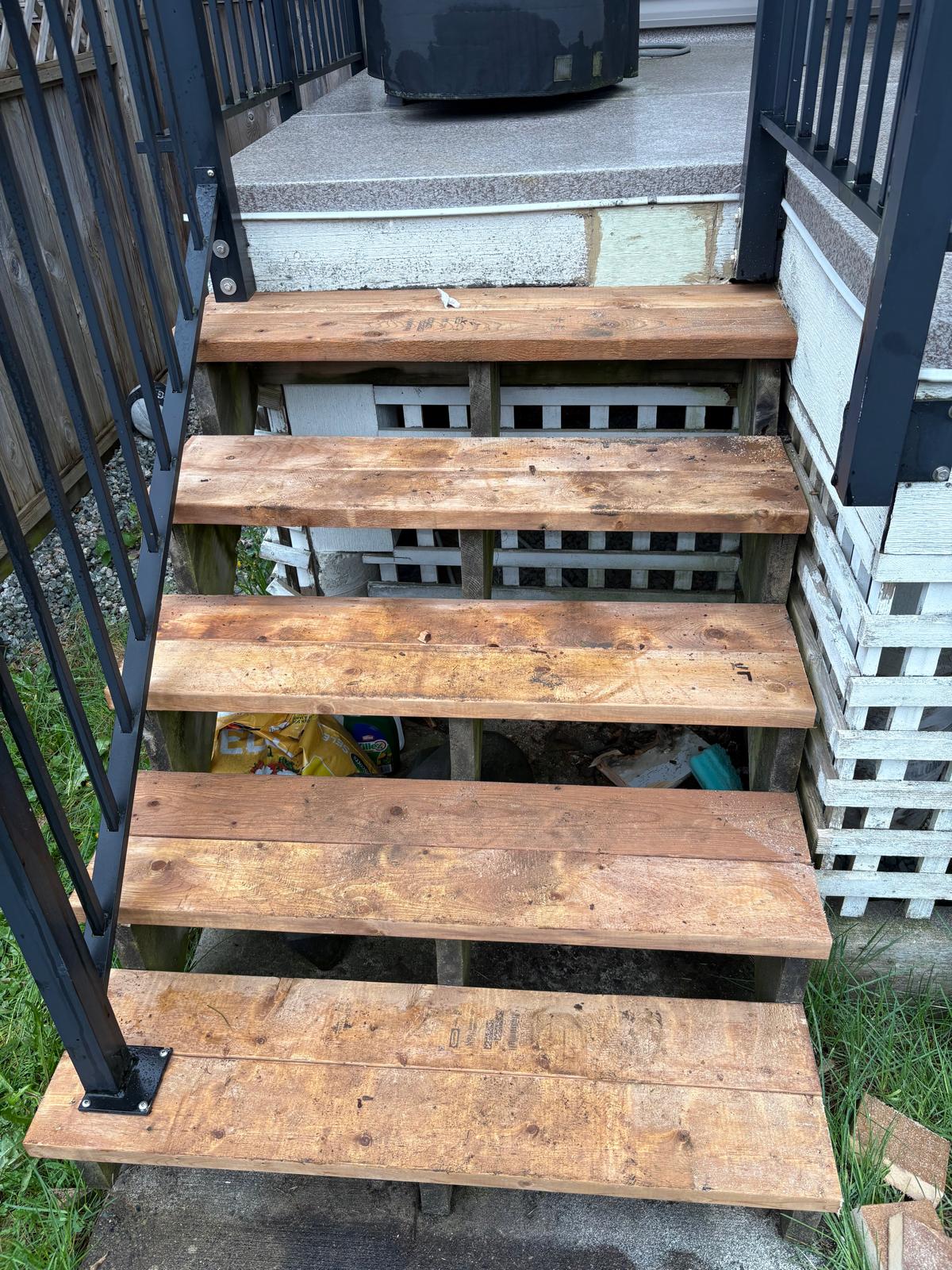 Repaired and refinished deck stairs